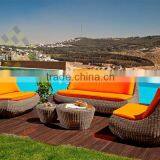 Round Wicker Traditional Sofa With Orange Cushion