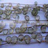 GREEN AMETHYST FACETED ALMOND GEMSTONE BEADS thumbnail-1