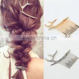 Stag Gold tone hair comb