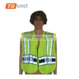 Roadway workers wearing security vest for traffic use