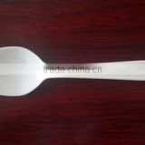 White plastic spoon