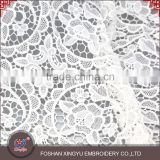 Chinese Manufacturer cutwork embroidery dress types of net lace fabric with meticulous care design