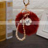 2021 Год Оптовая продажа индивидуально изготовленных роскошных ключей с шерстяными шариками, перловыми ключницами, ключницами с пупырышками и ленточными бантиками для женских сумок. Высокое качество. thumbnail-3
