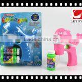 Kids Plastic Lovely Solid Color Musical Dolphin Bubble Gun With LED Light thumbnail-1