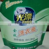 liquid detergent standing pouch with handle and spout