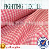 prestigious 55% cotton/45% polyester hot pink woven gingham check to cotton designer fabric