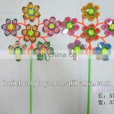 Six plastic fanny faces and flowres pinwheel HC101391