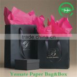 New plastic laminated black paper bag with ribbon handle for shopping gifts
