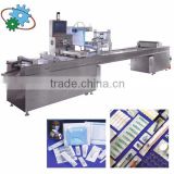 Disposable syringe sealing and packing machine