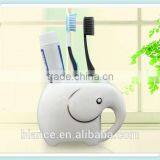 white ceramic family toothbrush holder in elephant design