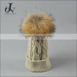 China Supplier Unisex Knitted Caps With Raccoon Fur Pompoms Balls Braid Hats