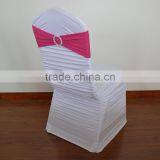 White ruched spandex chair cover and fuchsia spandex band with buckle