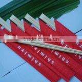 children learning bamboo chopsticks with silicone helper