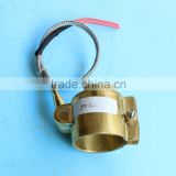 Sealed nozzle brass band heater for integrated thermocouple