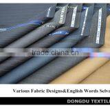 TR038 Soft Handfeeling English Words Selvage tr Suit Fabric