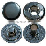 Button push metal/brass snap fastener for bags/trousers.