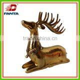 Gorgeous sitting iron Christmas reindeer for holiday decoration