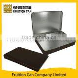 Flat rectangular tin with domed lid hinged lid