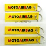 cheap wholesale yellow polyester custom embroidered keychain