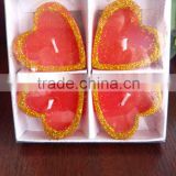 red shape heart candles decorated
