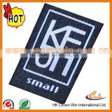 Blank garment labels with white words