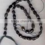 Iolite Oval Fac. Beads