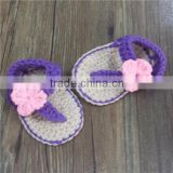 Crocheted baby flower purple flip flops