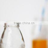 China Supplier Sales Cheap Price Clear Glass Beverage Bottles With Screw Cap thumbnail-2