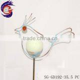 Decorating Garden Edging With Metal Glow in Dark Bird Stake thumbnail-3