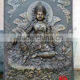 cast bronze kuan yin wall sculpture