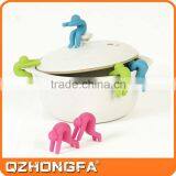 Hot Sale Man Shape Silicone Pot Spill-Proof, Kitchen Gadget, Phone Holder thumbnail-1