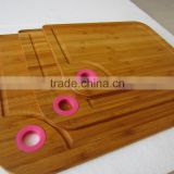 Three size bamboo cutting board with silicon handle