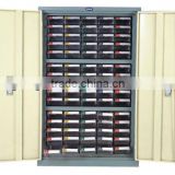 industrial parts cabinet with 75 plastic drawers and door