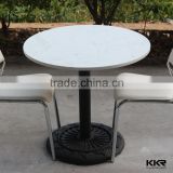 pure white round dining table for dining room