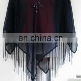 Poncho with handwork