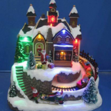 Polyresin Christmas Decoration 13” Led Gingerbread House With Rotating Figurines thumbnail-5