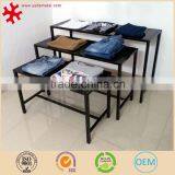 Modern 3-layer Retail Store Fixture Metal Clothing Display Table With 4 Legs