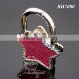 Wholesale Fashion Handbag Hook Enamel Purple Shimmering Powder Star Shaped Holder Foldable Metal Portable Bag Hanger thumbnail-3