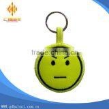 Cheap customized yellow sad baby face round floating key chain