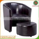 Sitting room leather Tub Chair and footrest