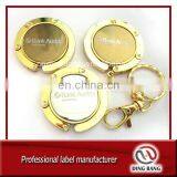 OEM Wholesale Stock Items Key chain Type And Promotion Souvenir Use Custom Blank Metal Gold Bag Hanger