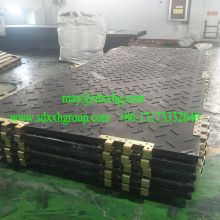 Mold pressed composite heavy duty construction road mat temporary road way