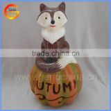 Ceramic halloween pumpkin with ceramic fox