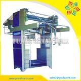 VERTICAL FABRIC-CUTTING MACHINE