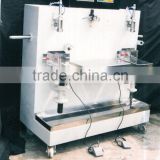 Semi Automatic liquid filling Machine with two head
