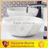 Carrara white honed Pluto basin