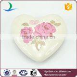 White Heart Shape Hanging With Pink Flower Decal thumbnail-1