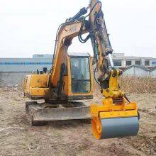 Excavator drum compactor