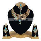 One Sided designer Turquoise Color Stone Gold Plated Kundan Zerconic Necklace Earrings Tikka