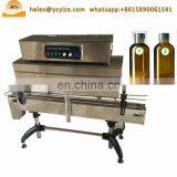 Semi-automatic Juice Bottle Label Sleeve Pet Bottle Cap / Pipe Shrink Wrap / Wrapping Machine thumbnail-7